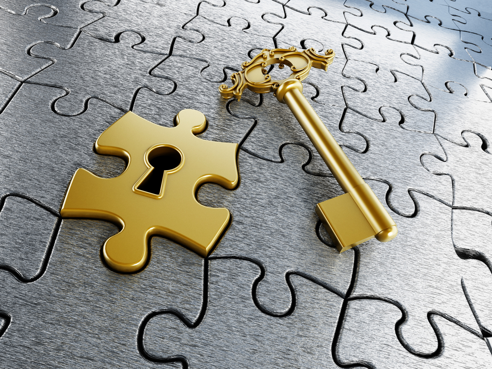 Gold jigsaw puzzle piece and key